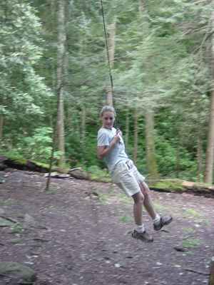 Sherri Bernheisel swinging on a bear trap - Smoky Mountain National Park - Hiking Tennessee