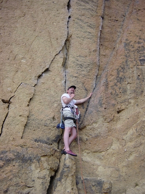 Joel Hass pondering the lead of Karate Crack 5.10a - The Dihedrals - Smith Rock - Climbing Oregon