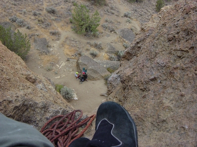 Jody O'Donnell sitting in the belay station after the first pitch on Spiderman - traditional climbing