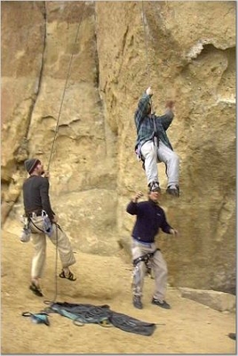 Eric and Travis Wiggins catching Jody O'Donnell as he plummets off of Herecy - Christian Brothers - Smith Rock - Climbing Oregon